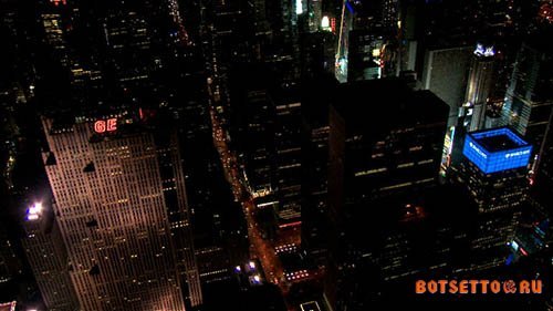 Aerial Night Shot Panning Past New York Ge Building